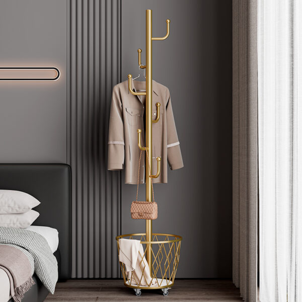 Portable single-pole coat rack with 6 hooks and storage basket; floor-standing coat rack for bedroom and hallway; casters for easy movement; modern minimalist design.